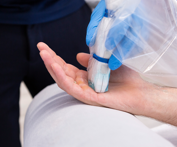 physiotherapist treating hand and wrist pain
